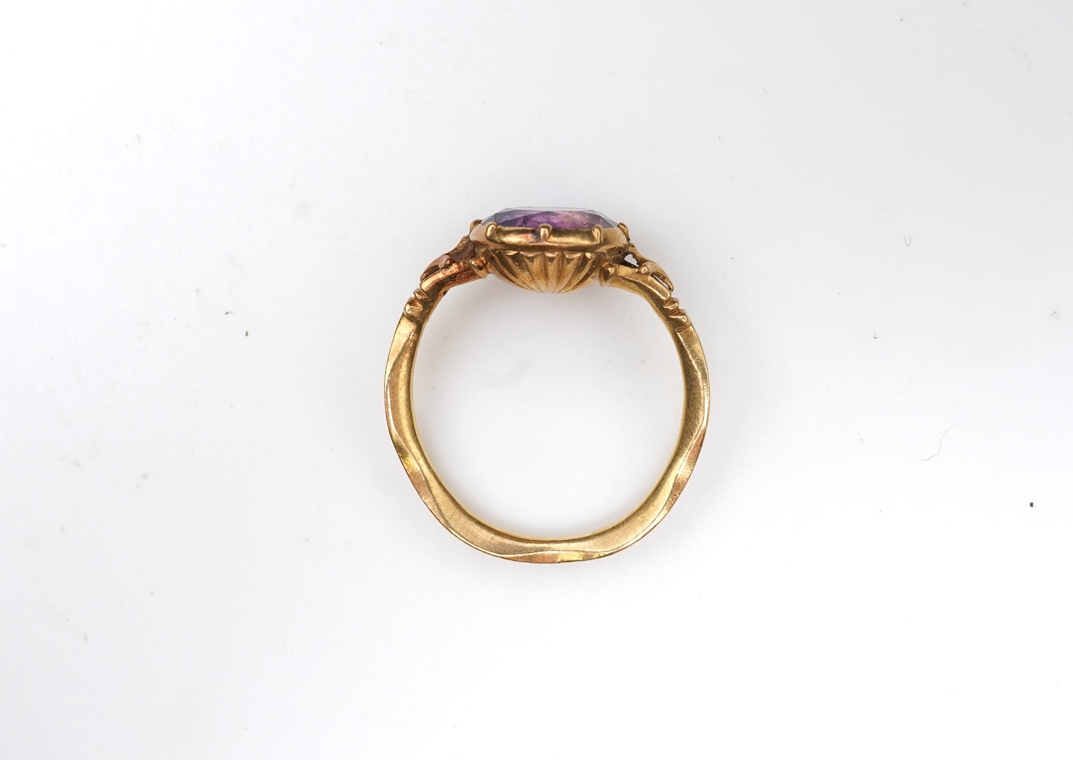 A rare and unusual George III amethyst and enamel mourning ring, late 18th century